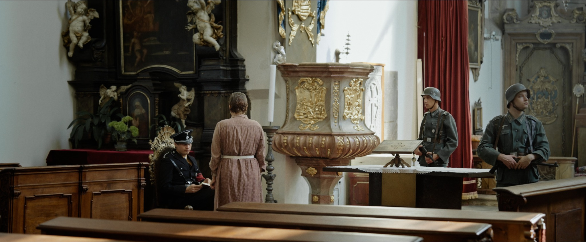 A confrontation inside an ornate church, from Elise’s Secret.